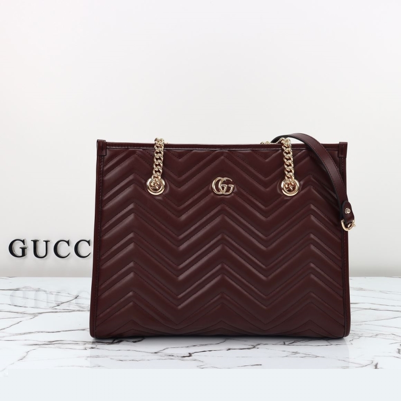 G*u*i shopping bags